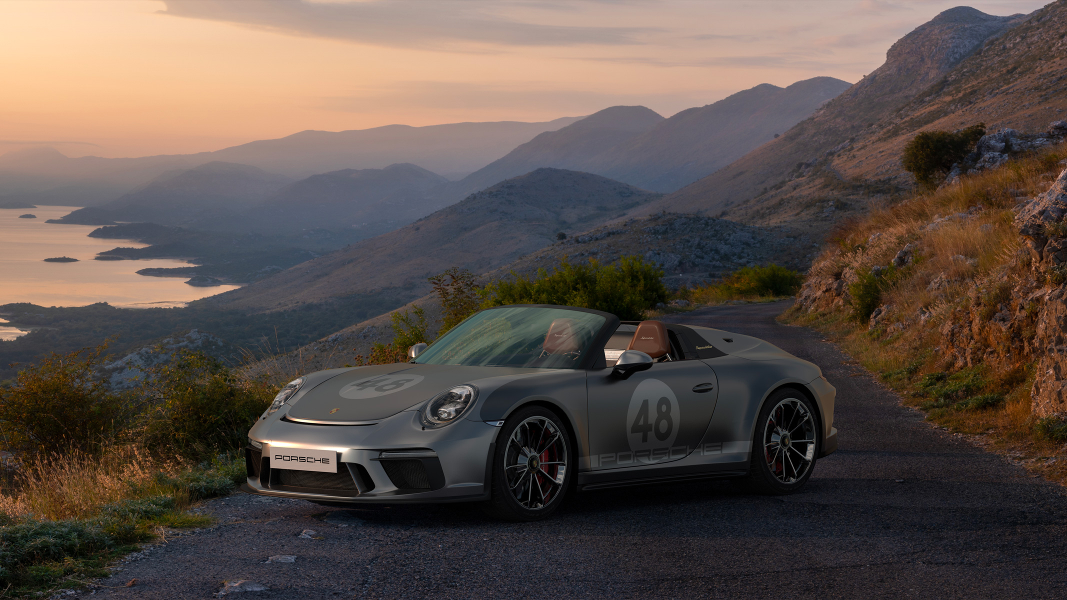 Porsche mise en avant devant un paysage.