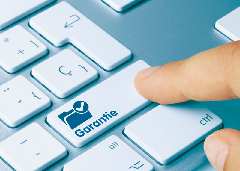 bouton d'ordinateur indiquant le mot garantie